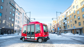 An automated bus driving around in Barkabystaden.