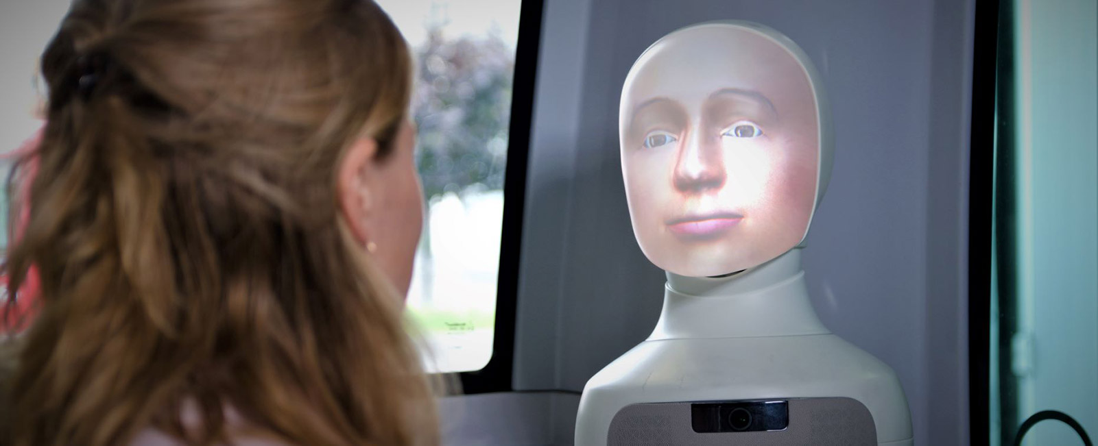 Social robot on driverless bus