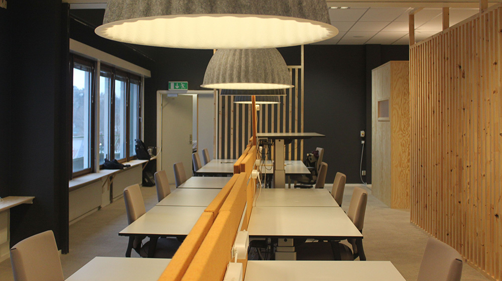 A row of desks at the Living Lab