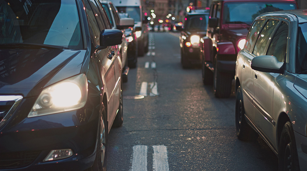 Cars waiting in traffic.