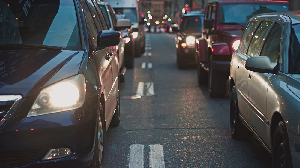 Cars at a traffic light.