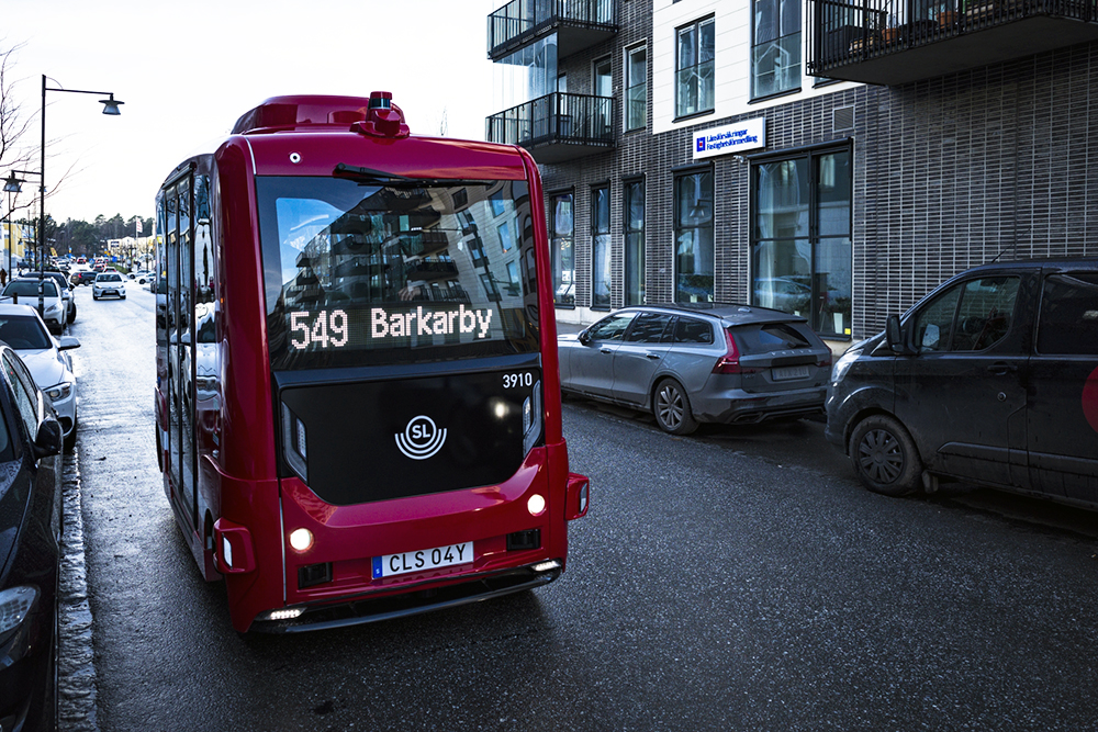 Self-driving bus on a busy street