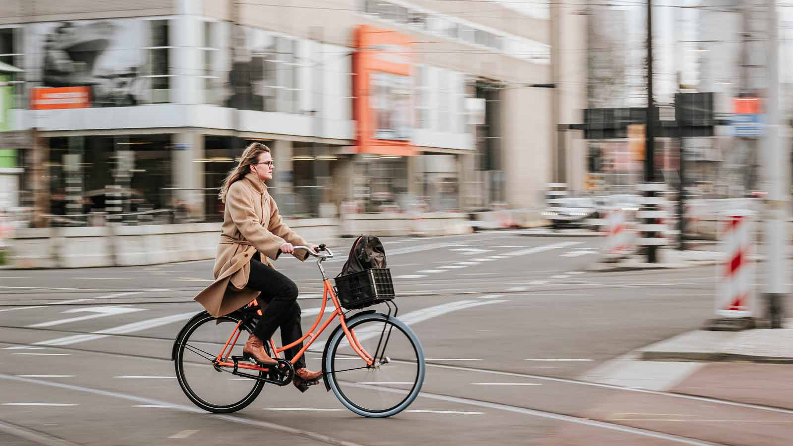 Woman biking in a city